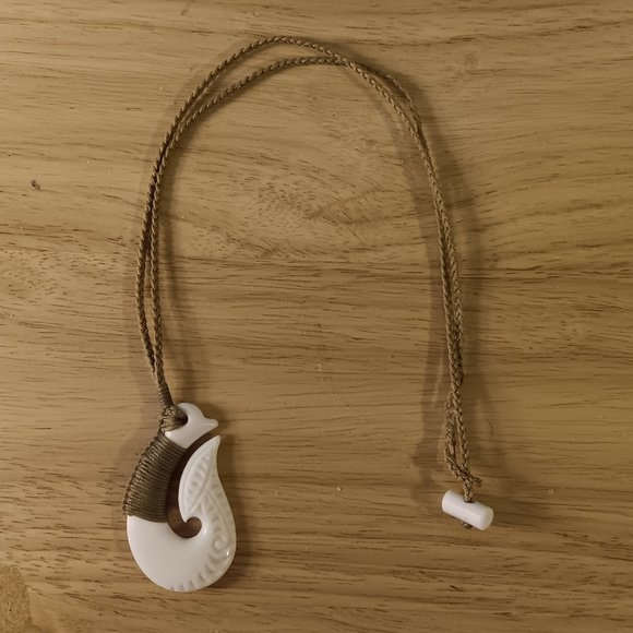 Bound Engraved Matau Handcrafted Bone Pendant - Picture 1 of 11